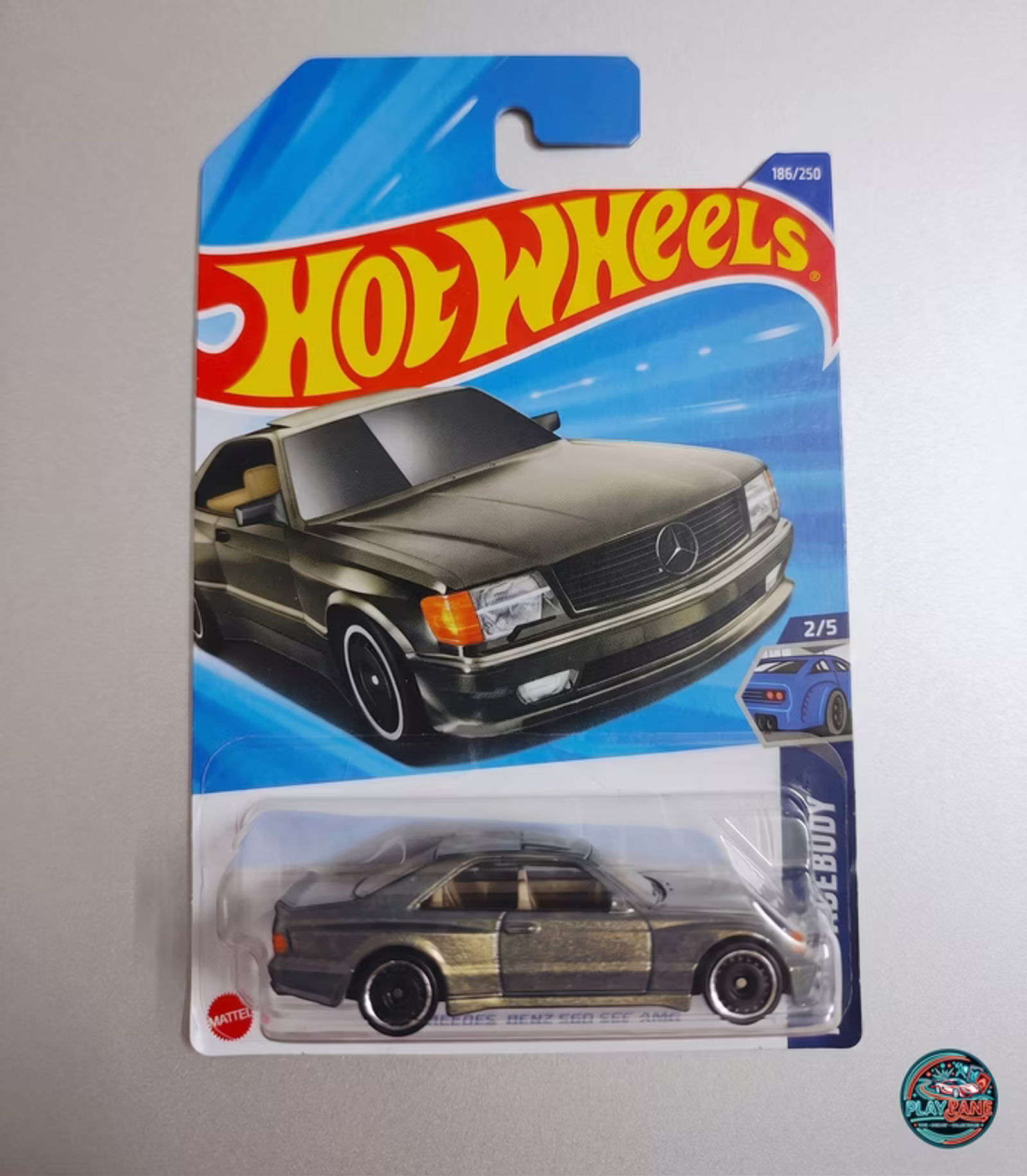 Hot Wheels 1989 Mercedes-Benz 560 SEC AMG (2/5) – 1:64 Scale Diecast Car | Imported - Main View 1
