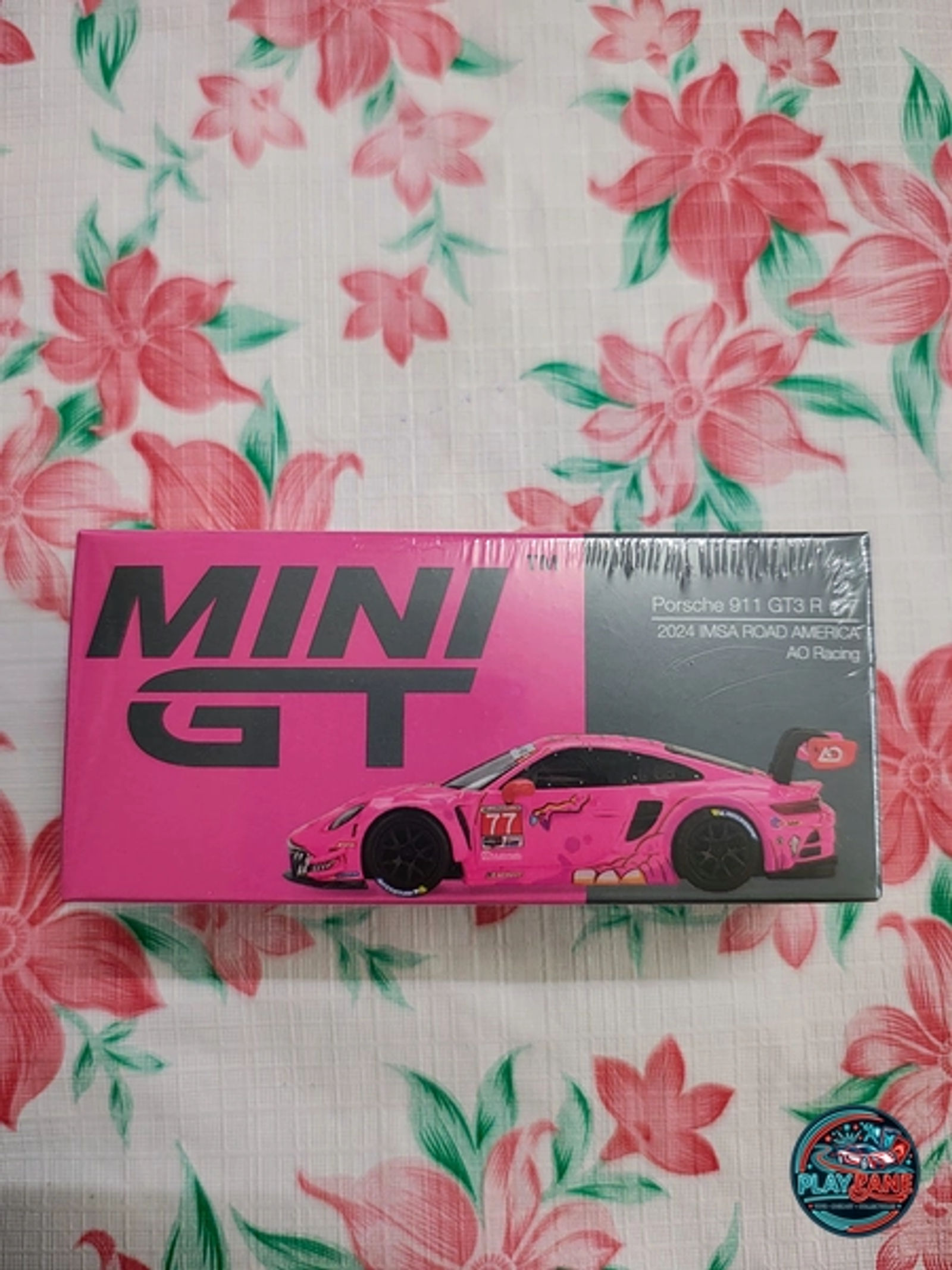 Mini GT 1:64 Porsche 911 (992) GT3 R – "Roxy" #77 AO Racing | Premium Imported Diecast - Main View 1