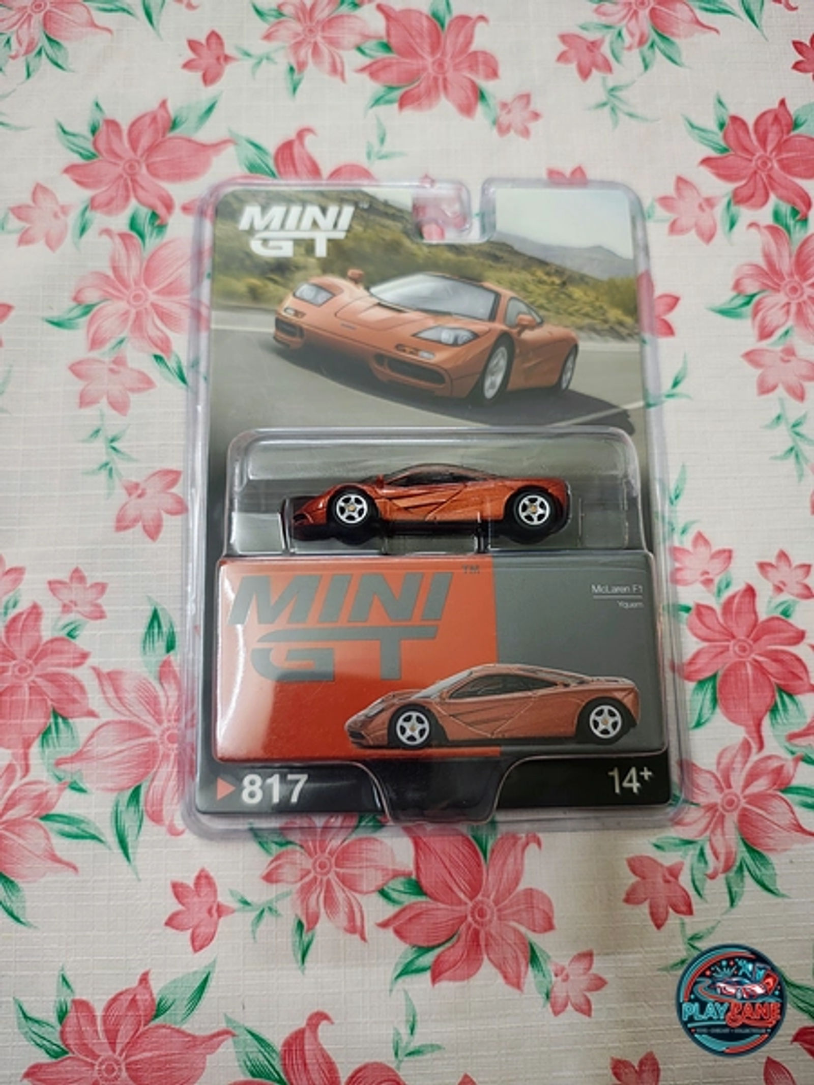 Mini GT 1:64 McLaren F1 – Yquem Orange (Model #817 BL) Premium Blister Pack Edition (Imported) - Main View 1