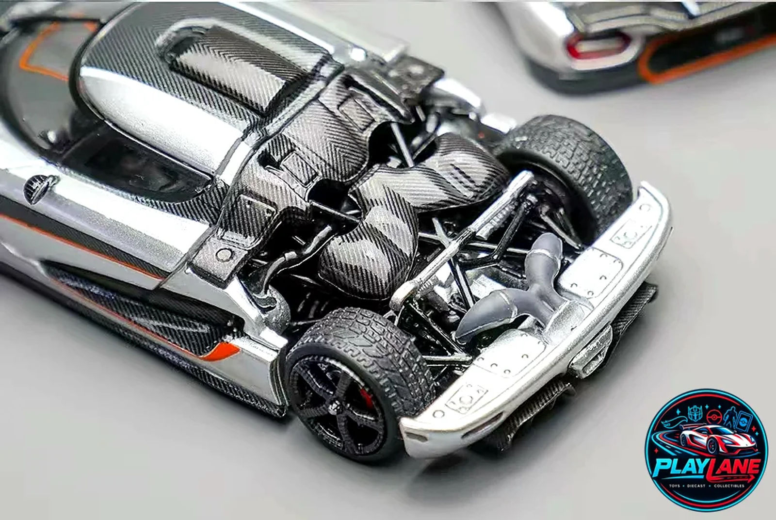 TPC 1:64 Koenigsegg Agera One:1 Silver Metallic Limited Edition Die-Cast Collector Model Car with Acrylic Display Case & Base - Main View 4